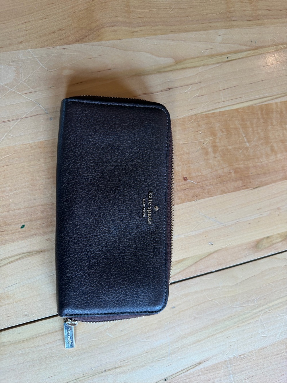 kate spade Pebbled Leather Zip Wallet in Dark Brown with Gold Logo